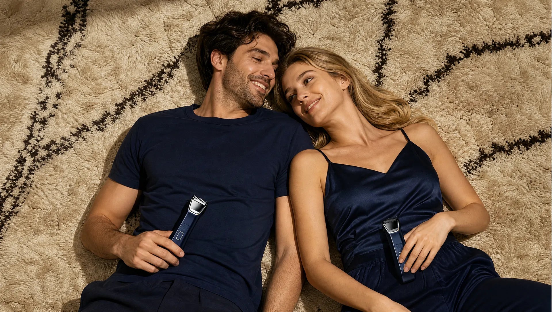 A couple relaxing at home with their JENTMAN body trimmers